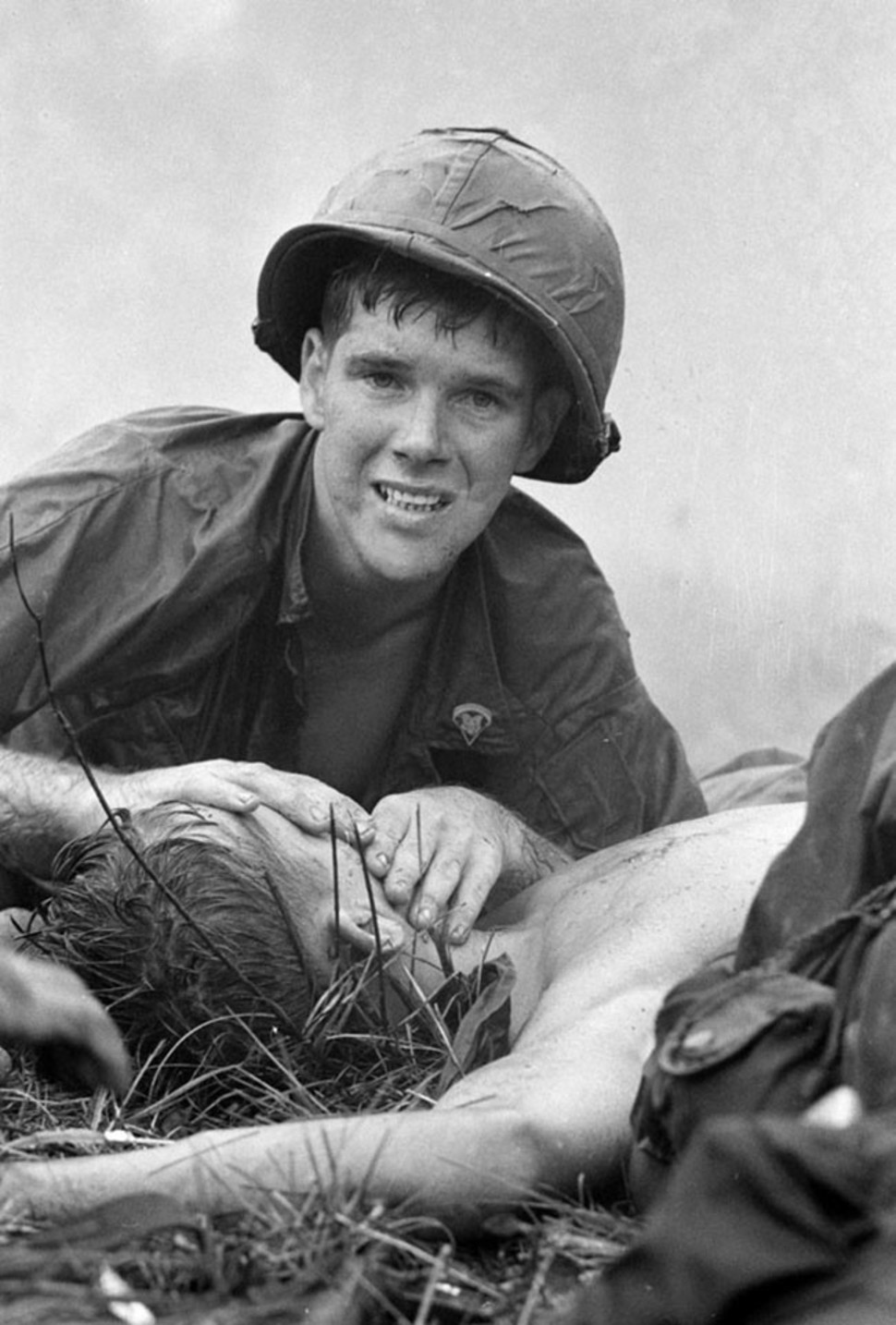 A US Medic attempts to save the life of a wounded comrade.