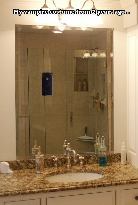 bathroom mirrors - My vampire costume from 2 years ago.