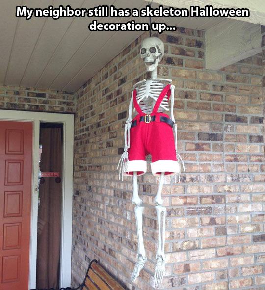 halloween christmas funny - My neighborstill has a skeleton Halloween decoration up...