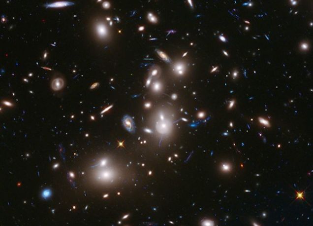 The Deepest into Space Anyone Has Ever Seen. Using a naturally-existing zoom lens in space, the Hubble telescope in January took the deepest look into a cluster of galaxies ever taken in space to grab these pictures of galaxy cluster Abell 2744.