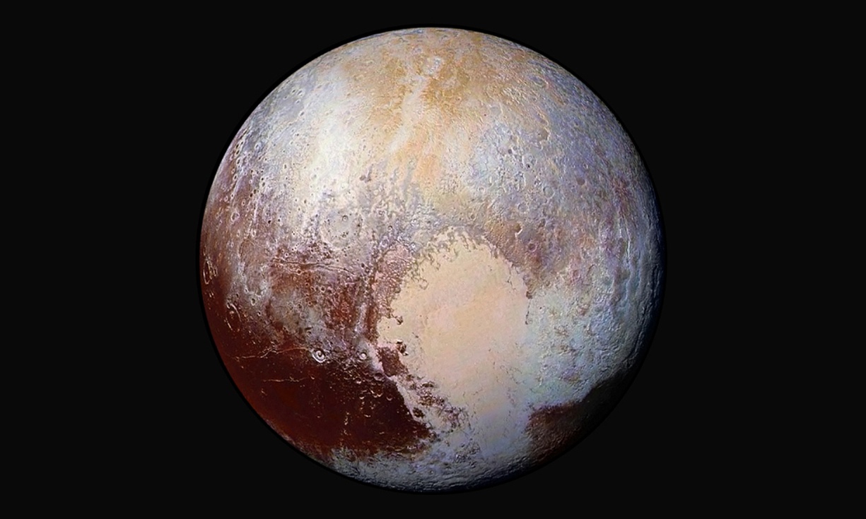 The far edge: a combination of images of Pluto captured by the New Horizons spacecraft with enhanced colors to show differences in the composition and texture of the planet’s surface.
