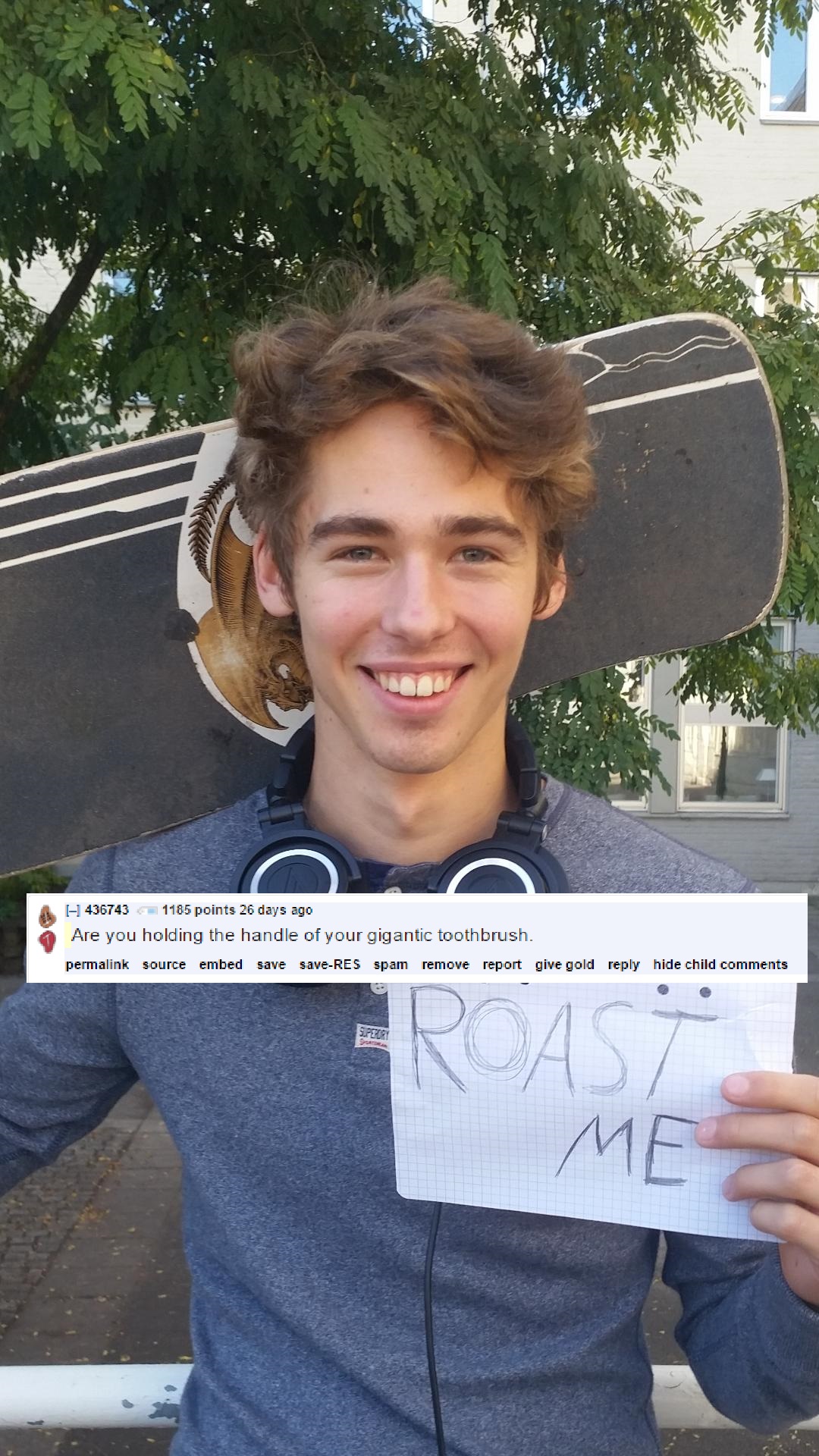 Skater with big teeth asks to be roasted and they joke that his skateboard is just the handle to his giant toothbrush.