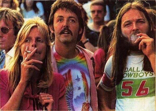 Paul Mccartney and David Gilmour sharing a joint at a Lynyrd Skynyrd concert in the '70s.