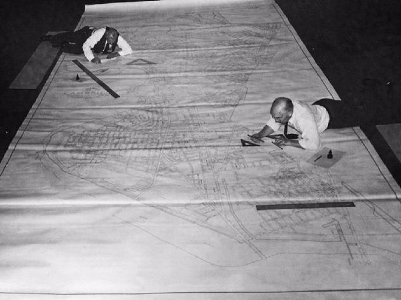 Before computers, we relied on t-squares, rulers & ink. Workers map Cambridge electrical system in 1950.