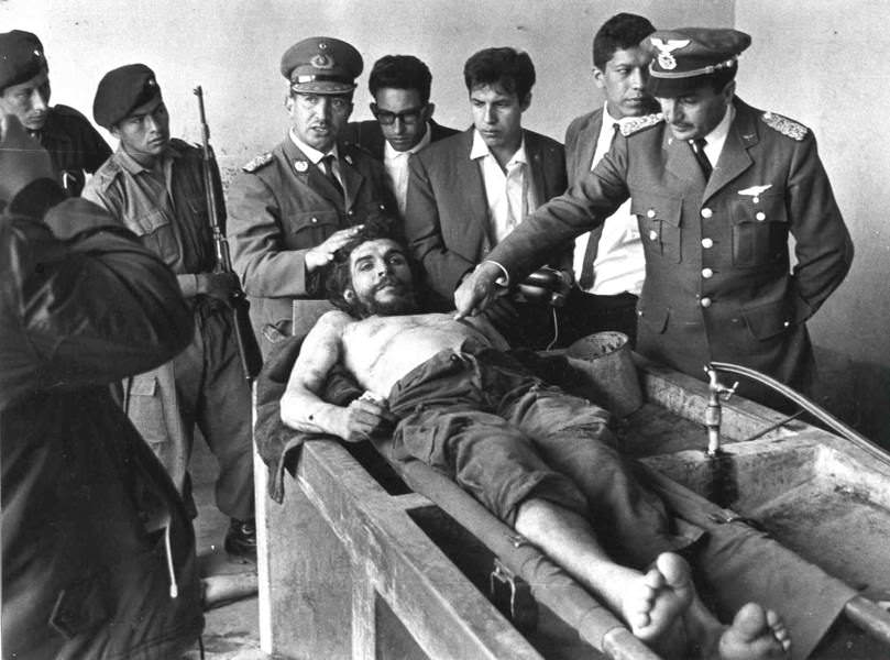 The Bolivian government poses with the corpse of revolutionary Che Guevara, 1967.