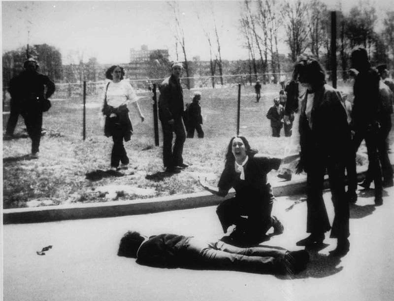 14-year-old Mary Ann Vecchio cries before recently deceased Jeffrey Miller moments after he was shot by the Ohio National Guard during the Kent State shootings, 1970.