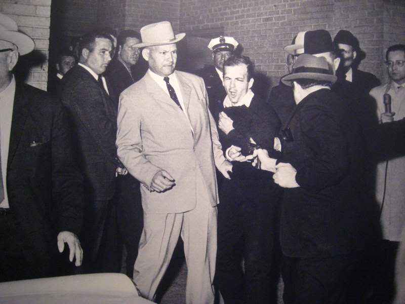 Nightclub owner Jack Ruby shoots Lee Harvey Oswald, the man who assassinated JFK, November 1963.