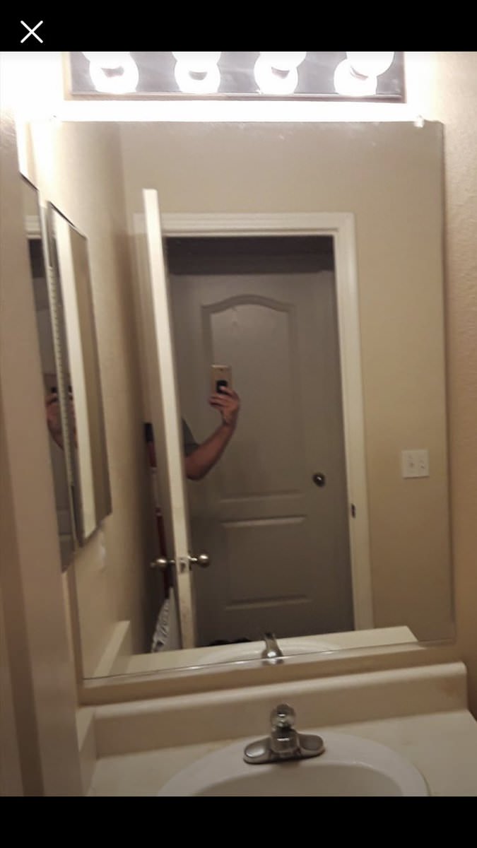 taking a picture of a mirror