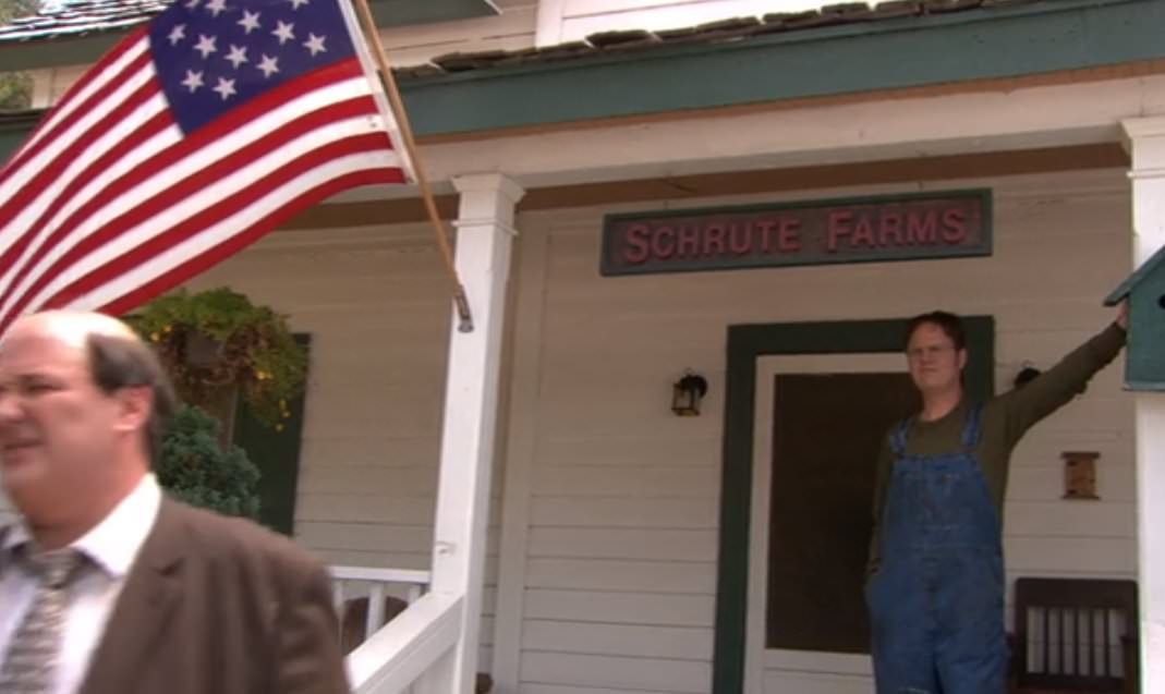 The porch of Schrute Farms sports a flag that only bears 15 stars. The 15 star flag (which also had 15 stripes) was created in 1795, representing the addition of Vermont and Kentucky to the 13 original colonies. Though more states were added in that time, the flag didn't change again until 1818. Schrute Farms was established in 1812, which puts it right in that historical window. Nobody has changed the flag in over 200 years.