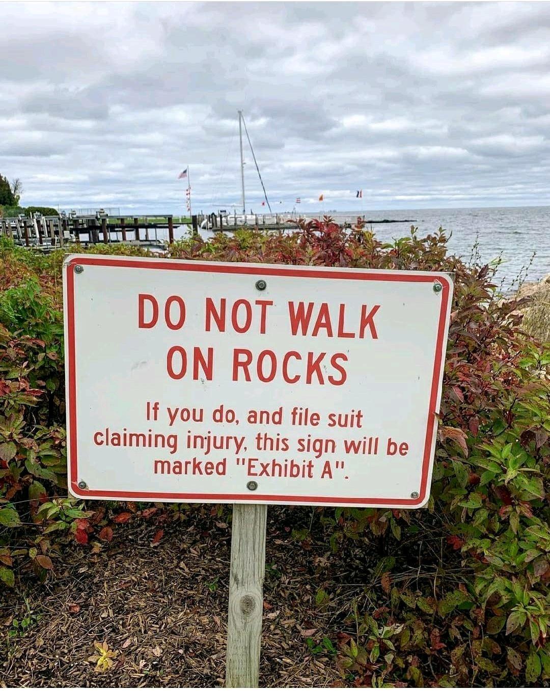 assumption of risk - Do Not Walk On Rocks If you do, and file suit claiming injury, this sign will be marked "Exhibit A".