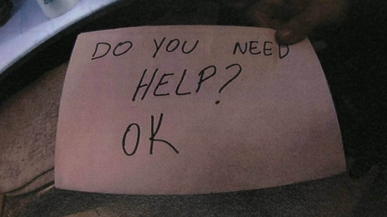 The server flashed a handwritten note to a little boy at her table. He wore glasses, a mask and a hoodie, but bruises peeked out from behind all of them. “ARE YOU OK?” the note said. The boy nodded. She flashed a second sign behind his parents’ back a few minutes later. “DO YOU NEED HELP?”

This time, he nodded.
