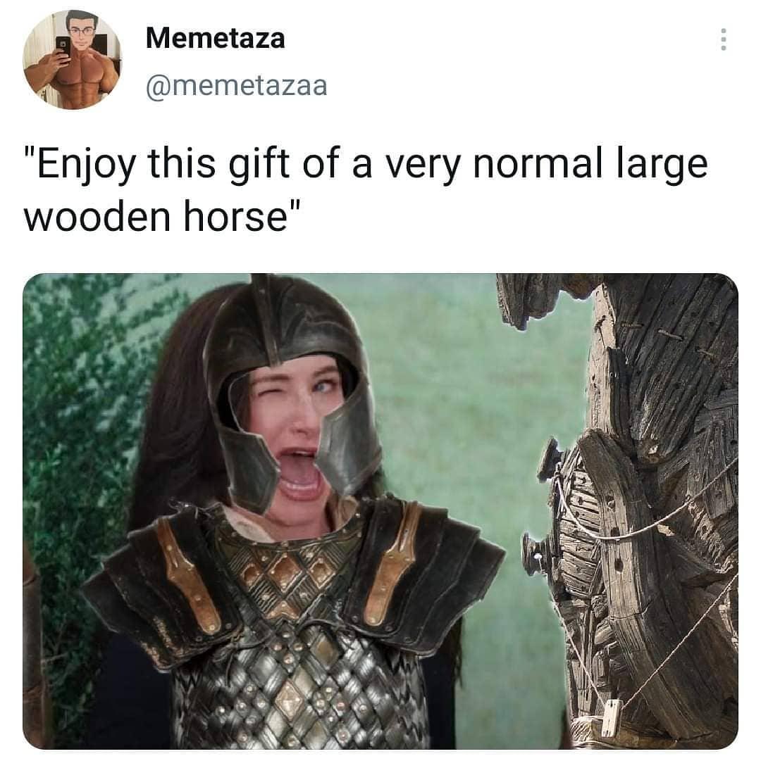 photo caption - Memetaza "Enjoy this gift of a very normal large wooden horse"