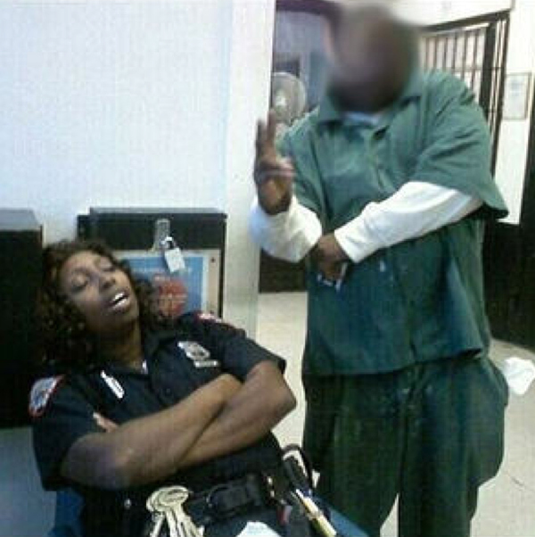 Inmate next to sleeping guard
