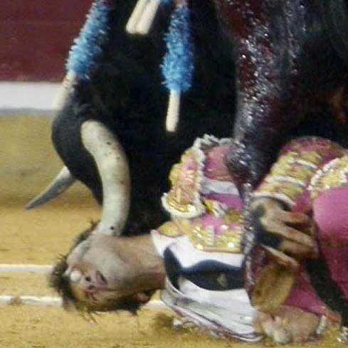 Bullfighter gored in the FACE!!!