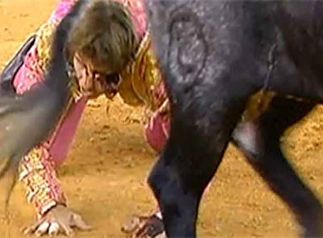 Bullfighter gored in the FACE!!!