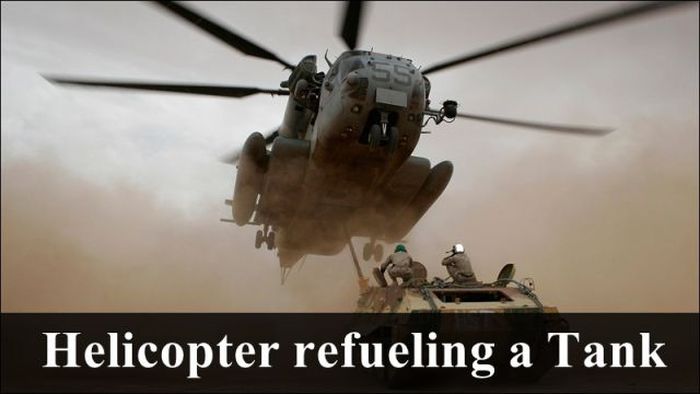 tank and helicopter - Helicopter refueling a Tank