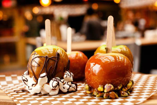 Candy apples - Samhain was around the same time of the Roman festival honoring Pamona, the goddess of fruit trees. She was often symbolized by an apple, so the fruit became synonymous with the Samhain harvest celebration.
