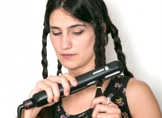 Running over your braids with a flat iron equals bohemian waves made easy.
