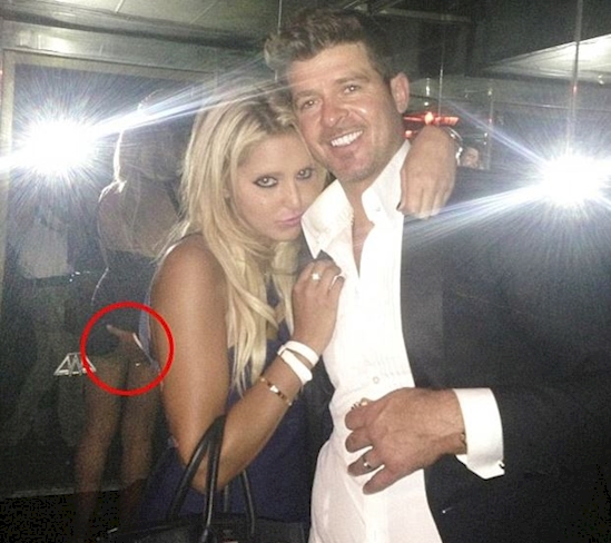 Robin Thicke’s grabby hands.
