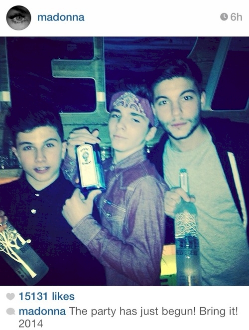 Madonna posting a snap of her underaged son with alcohol.
