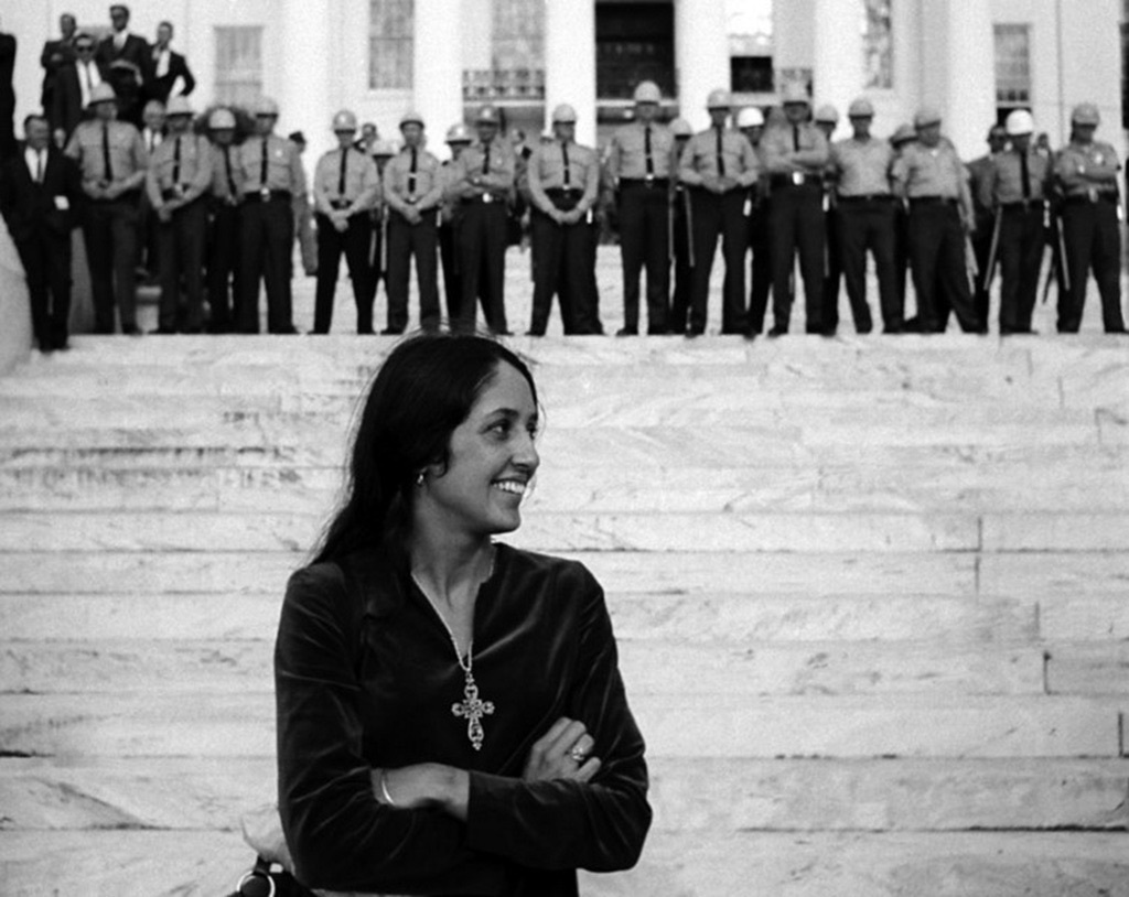 Joan Baez stands outside The Alabama State Capitol during the march to Montgomery.