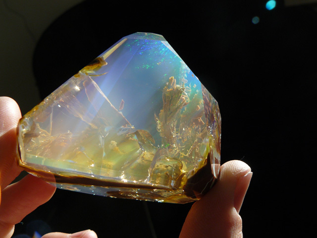 An ocean opal and its miniature illusion of an inside underwater world.
