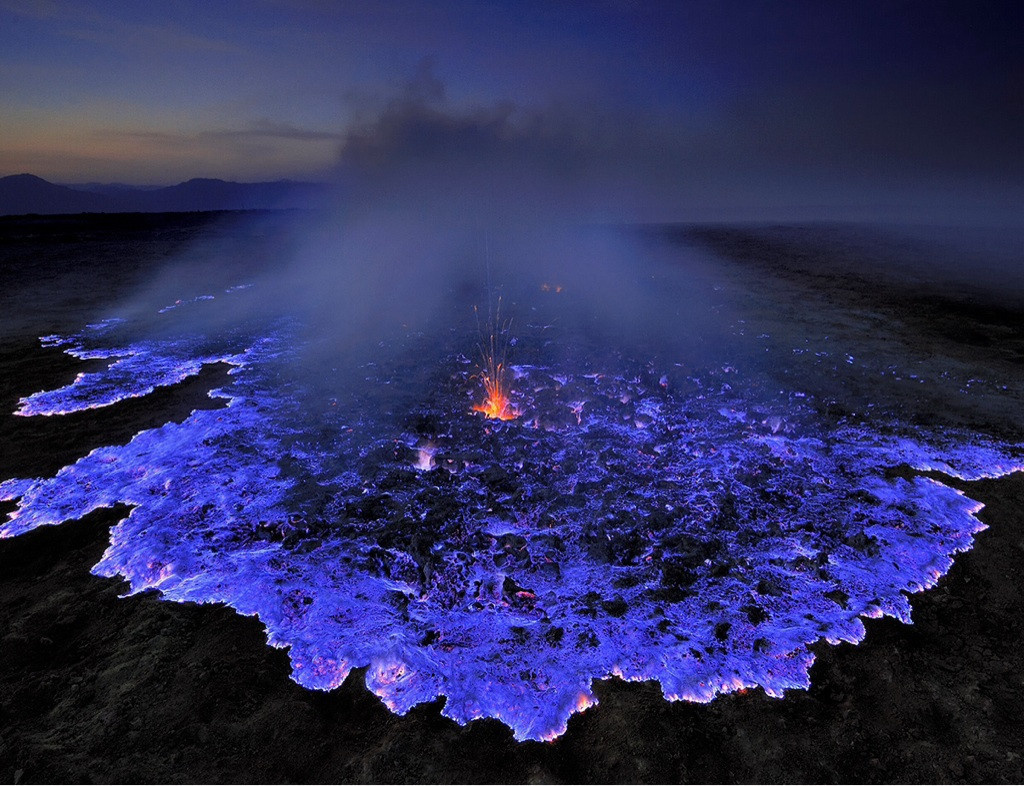Indonesia’s volcano Kawah Ijen releasing neon blue lava.