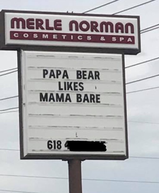street sign - Merle Norman Cosmetics & Spa Papa Bear Mama Bare 618