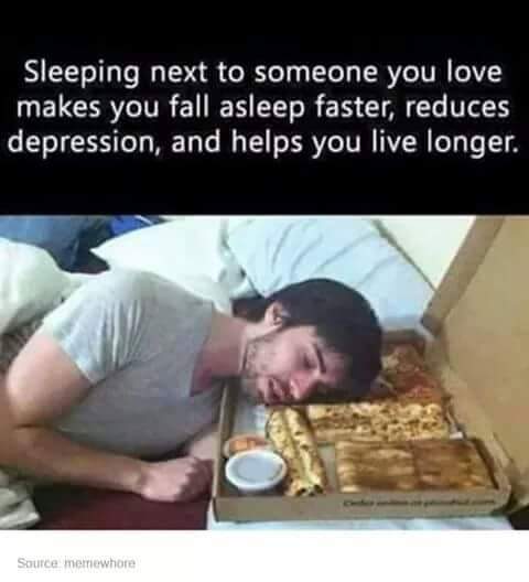 meme about the benefits of sleeping next to someone you love with man using pizza as a pillow