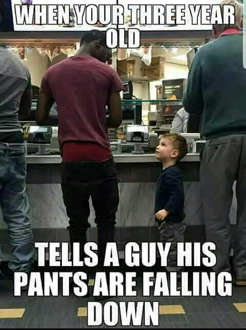 Meme of a kid telling a black man that his pants are falling down.