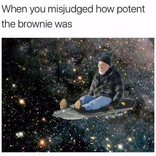 Man on a rug flying through space captioned about how it feels when you misjudged how potent the brownie was.