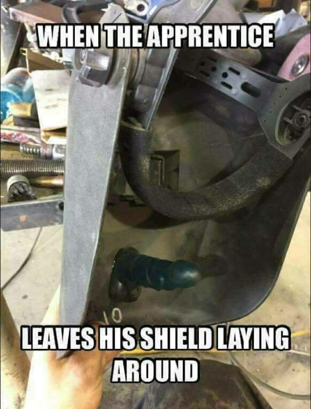Welding mask meme of an apprentice who has a dildo affixed to the mask so he can hold it in place with his mouth while...