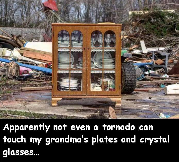 Closet full of grandma's fine crystal and china that survived intact from a tornado while everything all around is destroyed.