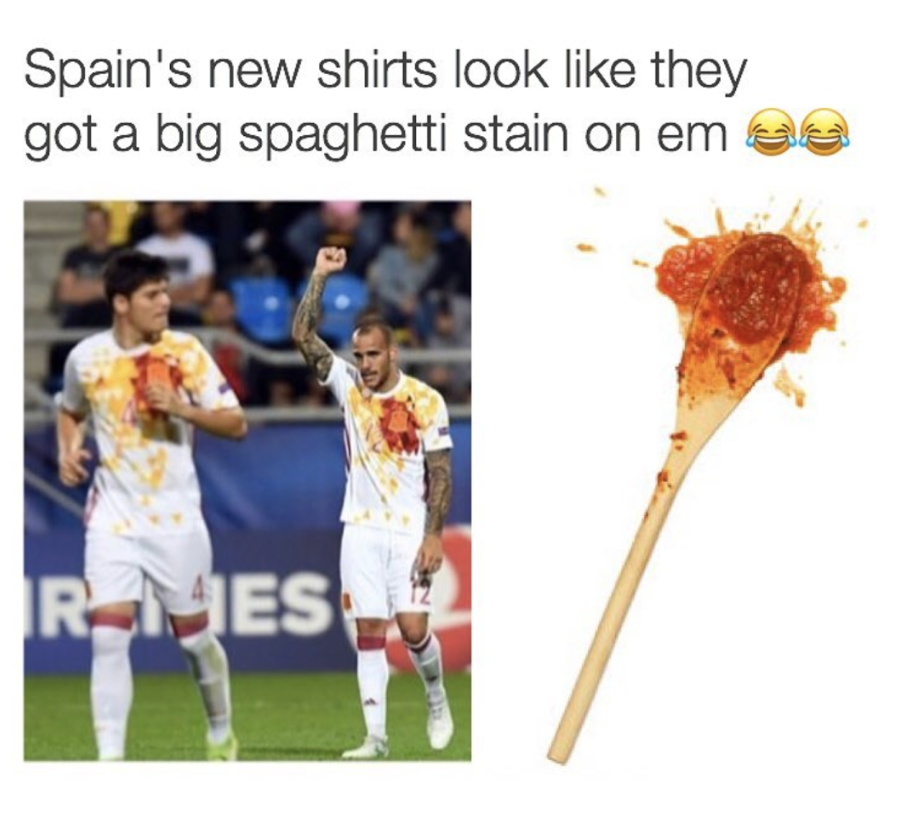 Spain football team that have shirts that look like they have a big spaghetti stain.