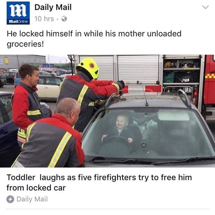 Toddler laughing as firefighters try to free him from his locked car.