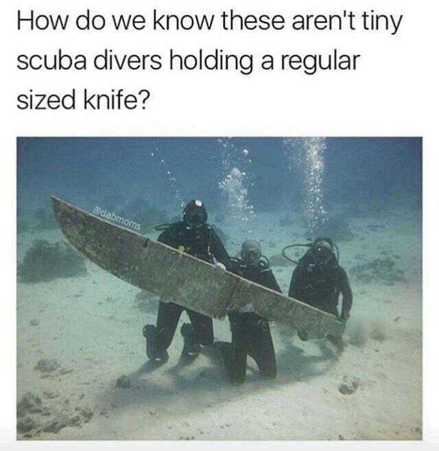 most mysterious - How do we know these aren't tiny scuba divers holding a regular sized knife?