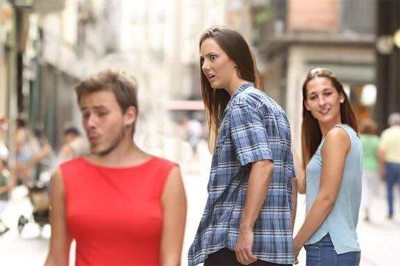 Distracted boyfriend meme with everyone's faces switched around.