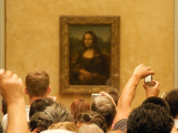 Everyday, hang the Mona Lisa in a different part of the Louvre. That way people might take the time to look at the other paintings while they search for it.