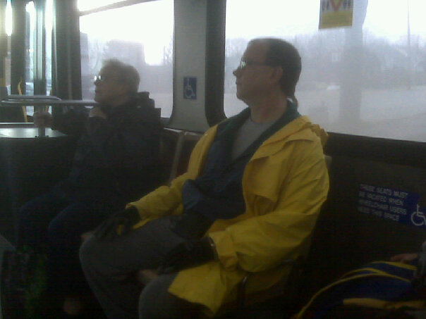 Guy was spotted on Halifax Metro Transit.. He's sporting a rat tail, a raincoat, sweatpants, and a fanny pack.. He stood up when the bus was stopping, and fell over.. For the record, it was not raining out, it was actually quite warm and sunny.. Quite hilarious