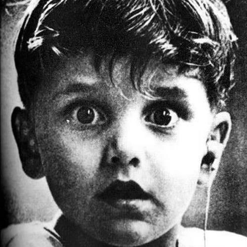 The little Jack Whittles, photographed at the exact moment doctors turned on his first hearing aid.