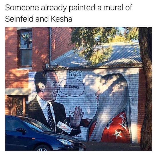 Mural someone painted of Seinfeld refusing a hug from Kesha