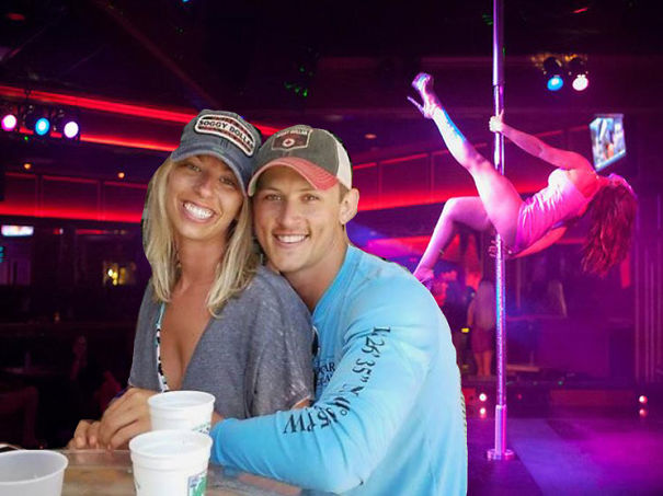 Engaged couple photoshop request has strip club placed in the background