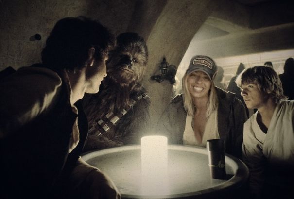 Engaged couple photoshopped into a Cantina scene in Star Wars