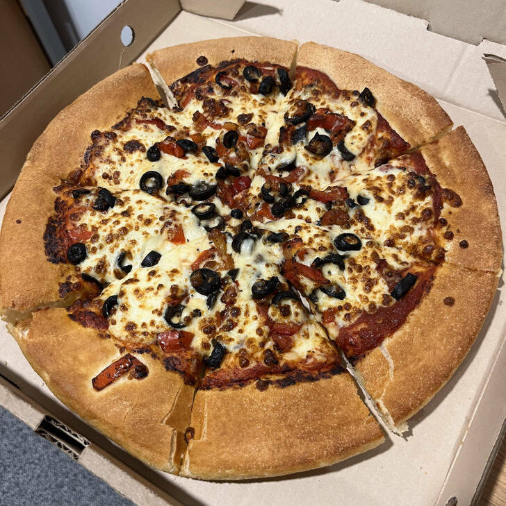 This pizza was made upside down.