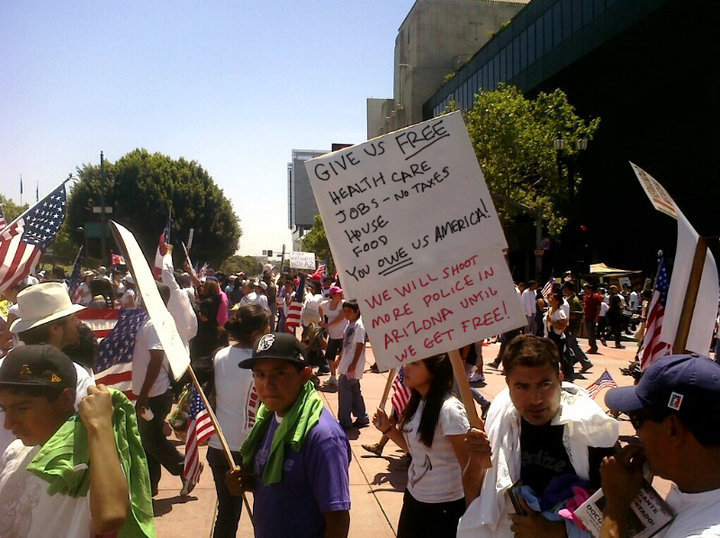 This is from Saturday's MoveOn.org funded and organized demonstrations against Arizona's new tough illegal alien law.   This photo needs maximum exposure...
Propaganda media will not be showing this side of the demonstrations.