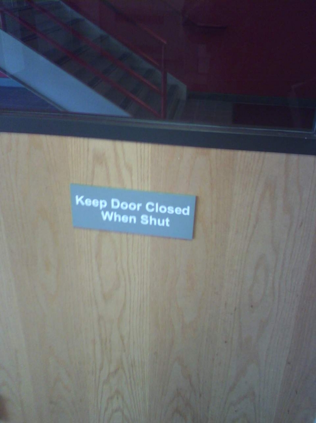 This sign is on a door at dmacc. Keep door closed when shut?