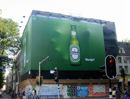 An innovative idea on a large billboard in Amsterdam, Netherlands. It really makes you want that Heineken.