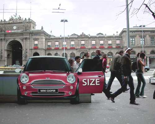 This is a creative ad by Mini Cooper placed at the Zurich, Switzerland train station. It gives the perception that the Mini Cooper has a large space.