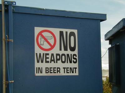 street sign - Weapons In Beer Tent