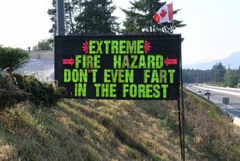 funny road signs - Extreme Fire Hazard Dont Even Fart In The Forest